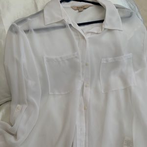 White long sleeve sheer top.